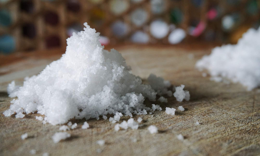 Pure Body Naturals Sitz Bath Salt spa ambiance image conveys a soothing home spa vibe.
