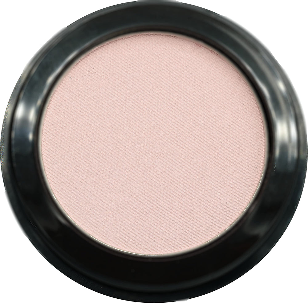 Pure Ziva Seashell light pink opaque matte pressed powder compact shows smooth finish.