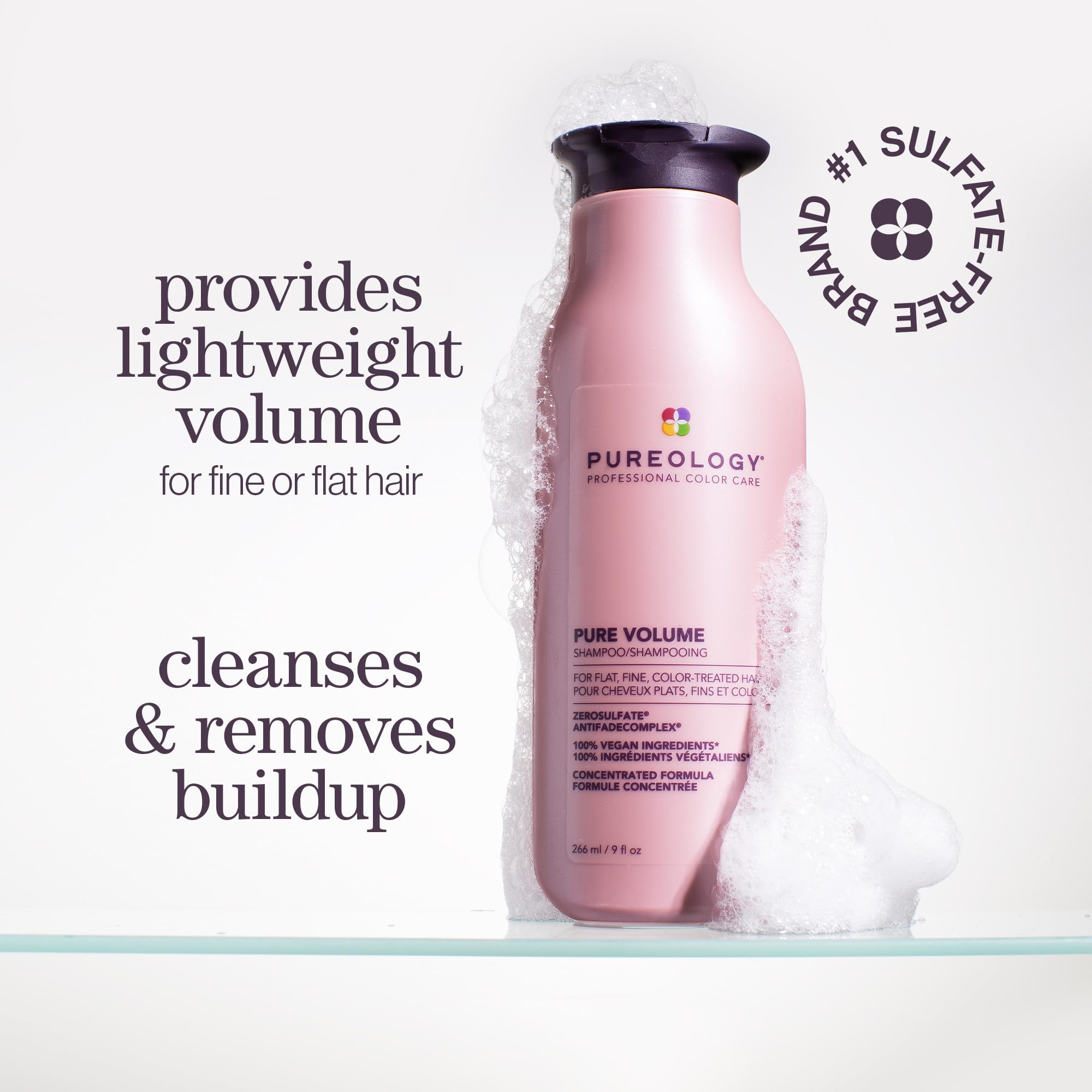 Pureology Pure Volume lather on hands demonstrates gentle cleansing for color-treated hair.