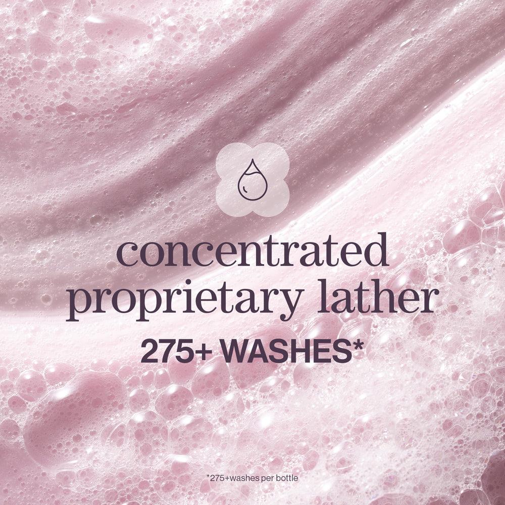 Pureology Pure Volume Shampoo splash captures shiny, bouncy hair movement.