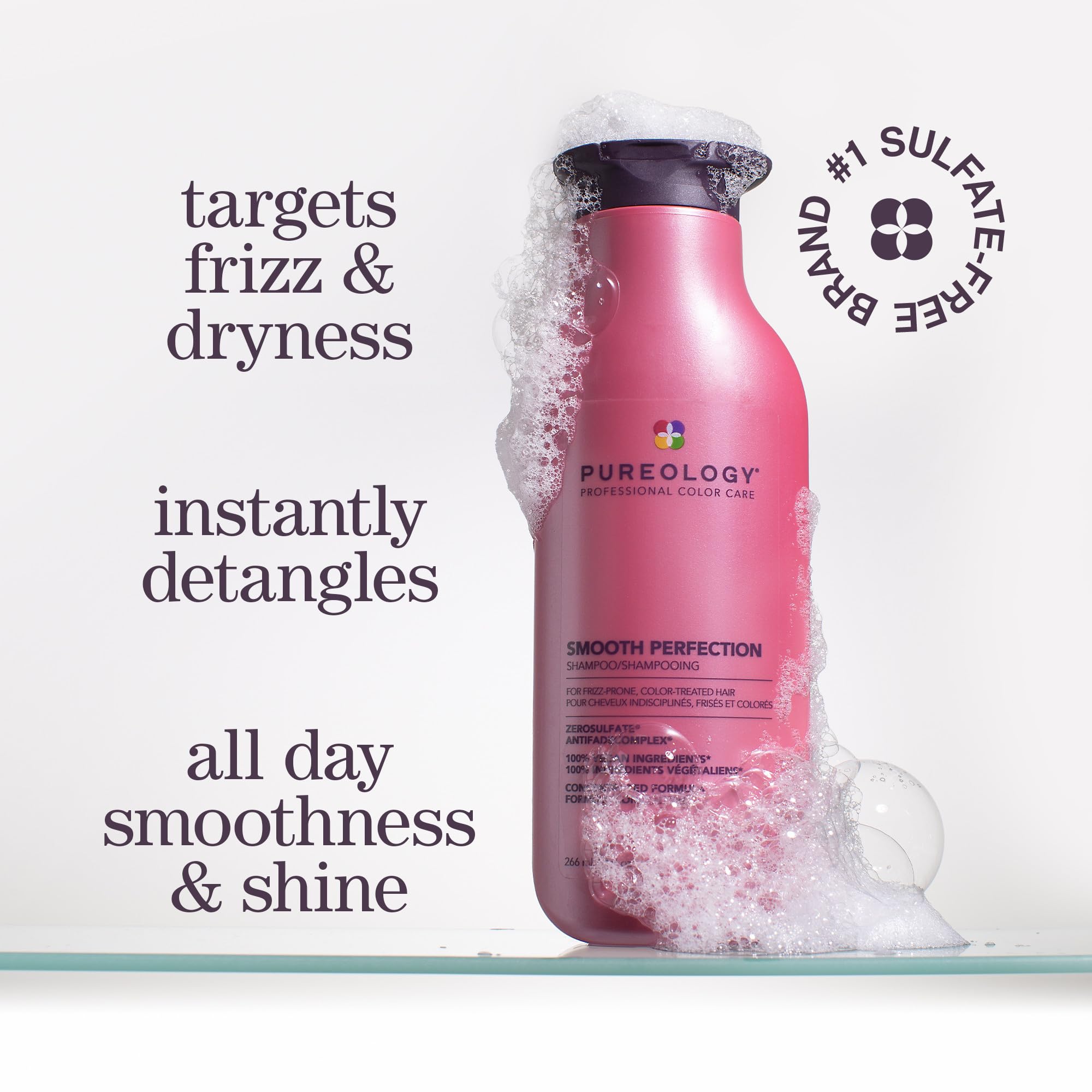 Pureology Smooth Perfection Shampoo lather on wet hair for frizz control.