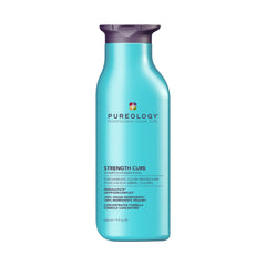 Pureology Strength Cure Shampoo bottle shows vegan, sulfate-free formula for damaged or color-treated hair.