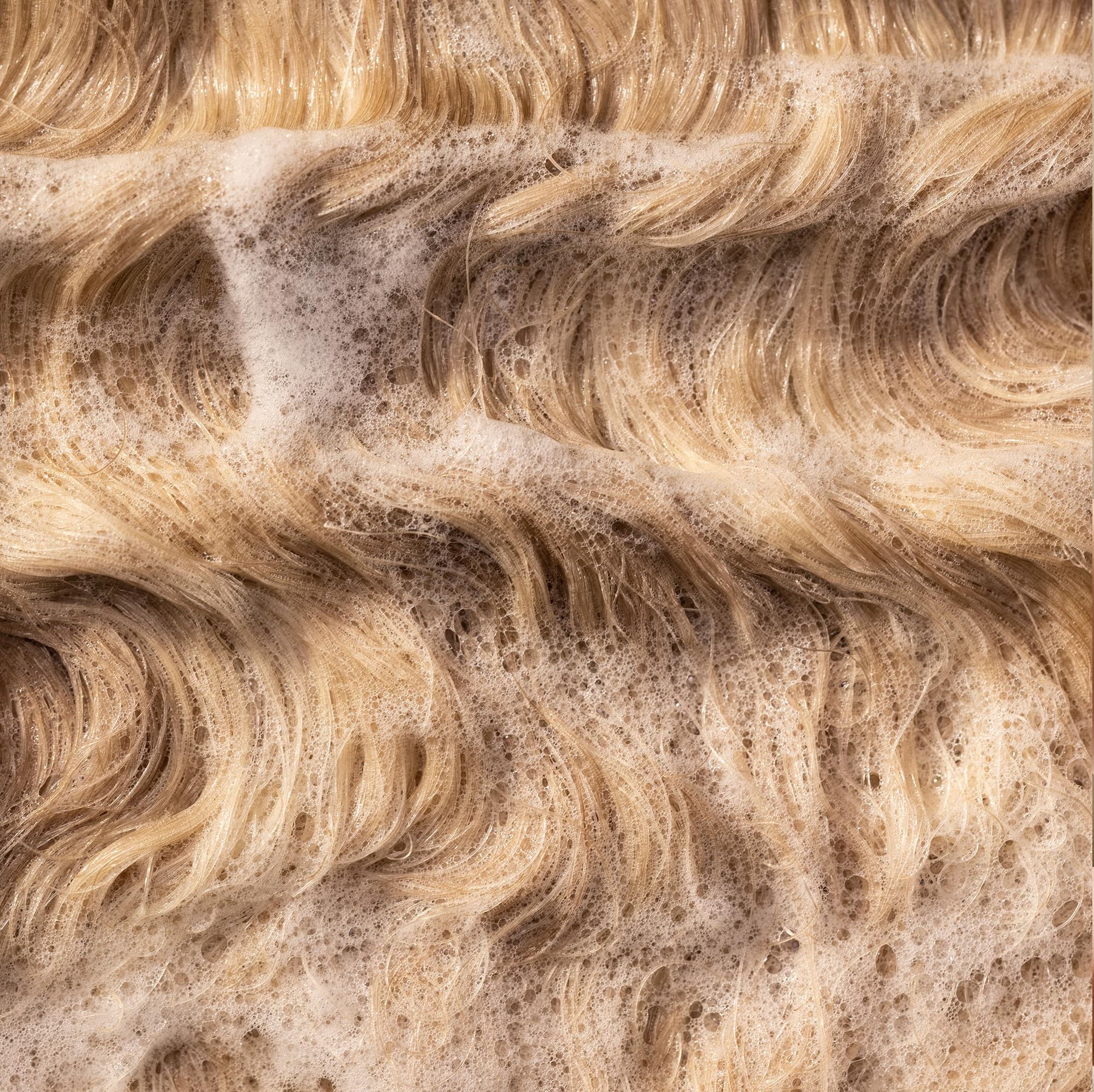 Shine and smoothness visible after regular use of Strength Cure.