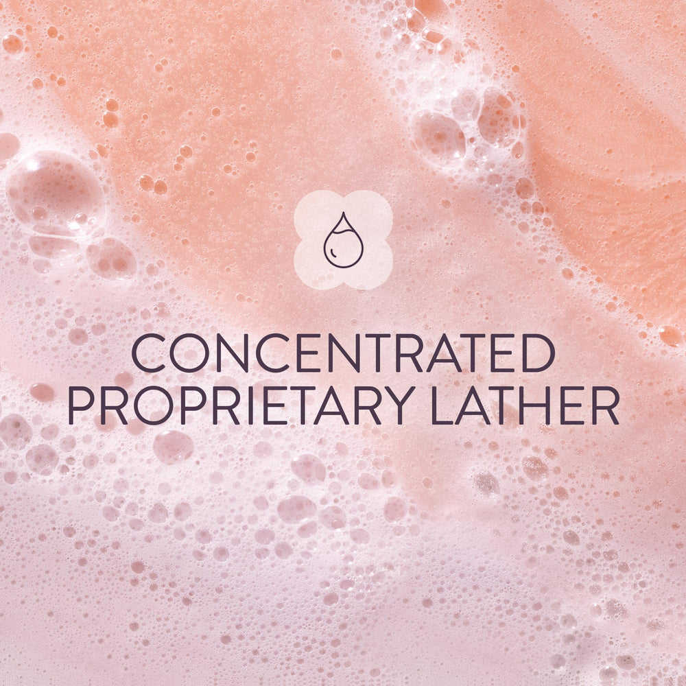 Vegan icon and Strength Cure branding on Pureology bottle.