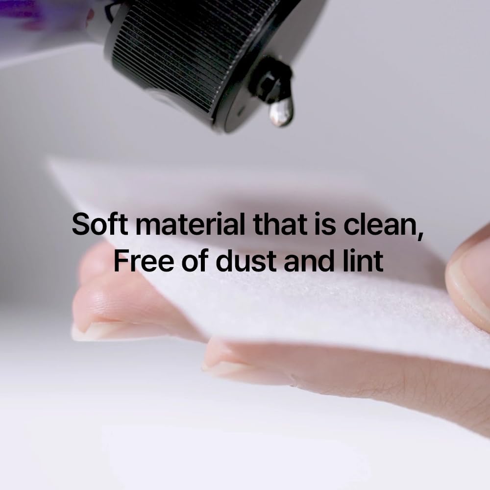 Pads held in hand illustrating generous size for efficient cleansing.