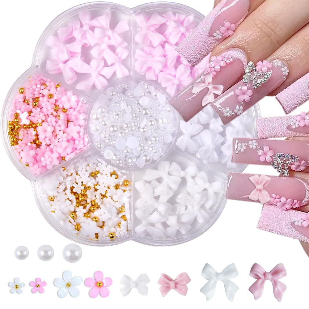 Adorno Qdsuh para uñas con lazo rosa, ideal para un look elegante.