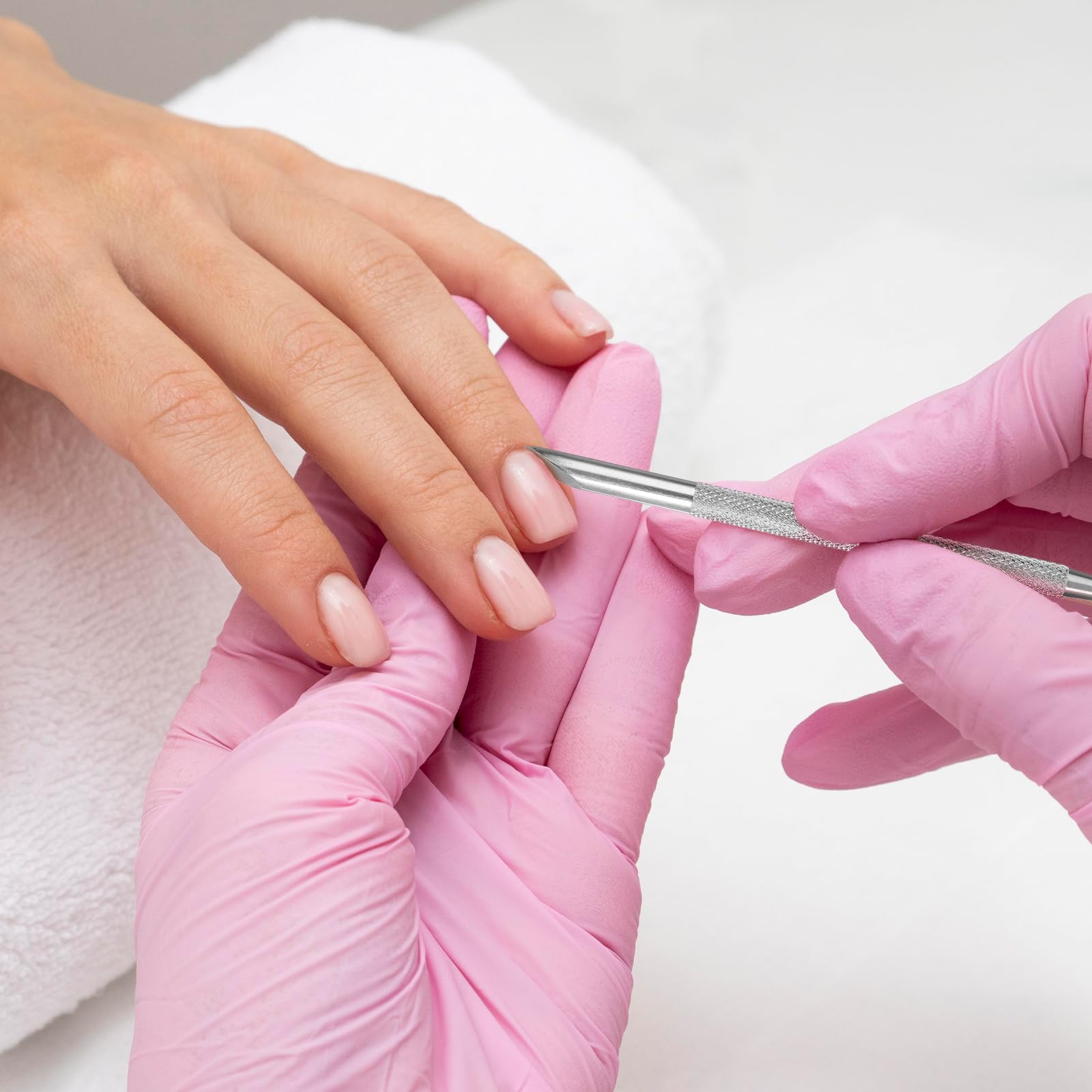 Qianyu cuticle pusher with non-slip handle for comfortable control during grooming.