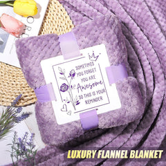 Qinline lavender relaxing spa candle provides calming ambiance.