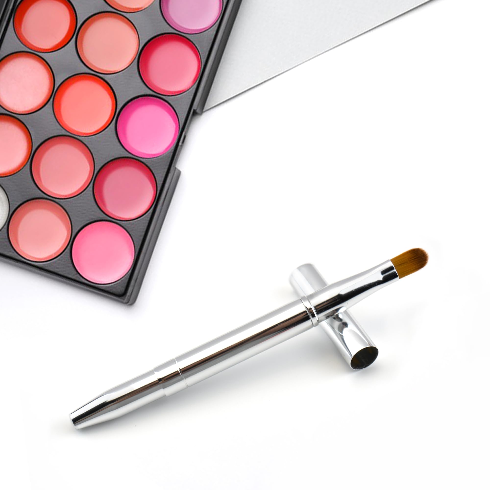 Quacc double-ended brush used on lips for lipstick application with precise outlining
