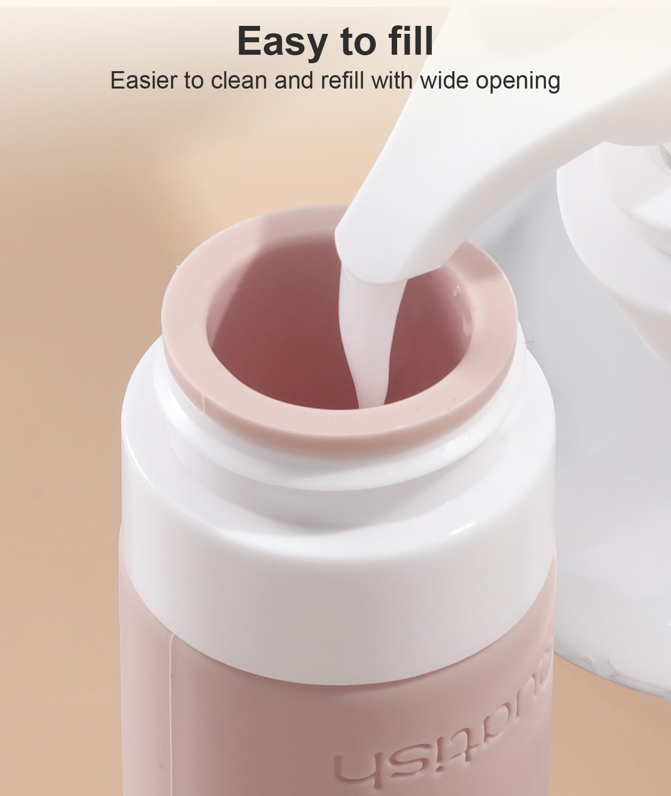 Quatish cross-orifice dispensing cap minimizes spills during use.