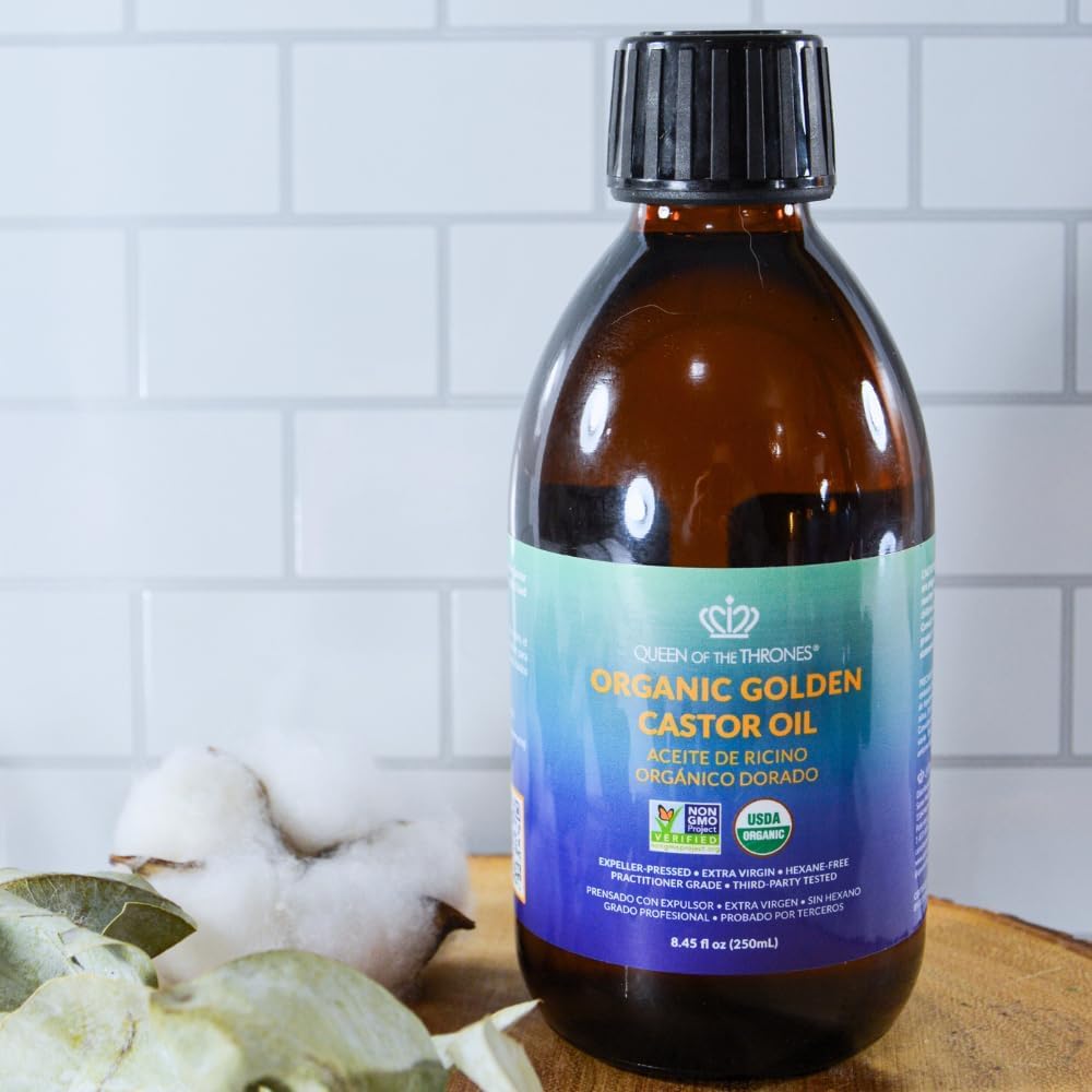 Dropper close-up of Queen of the Thrones oil for targeted scalp and lash care