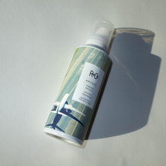 R+Co Aircraft Pomade Mousse dispenser in use for even texture and separation