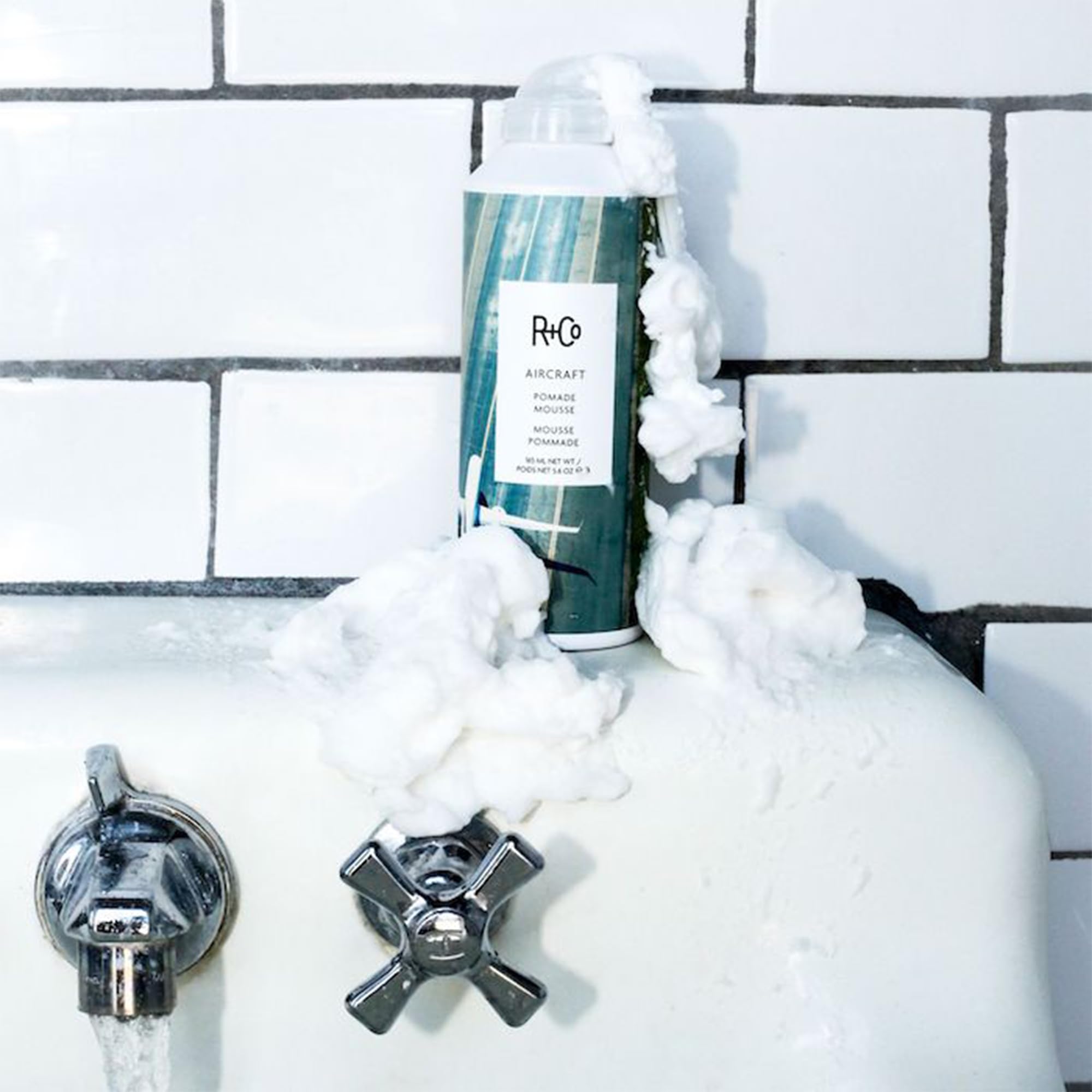 R+Co Aircraft Pomade Mousse papaya extract adds volume and shine