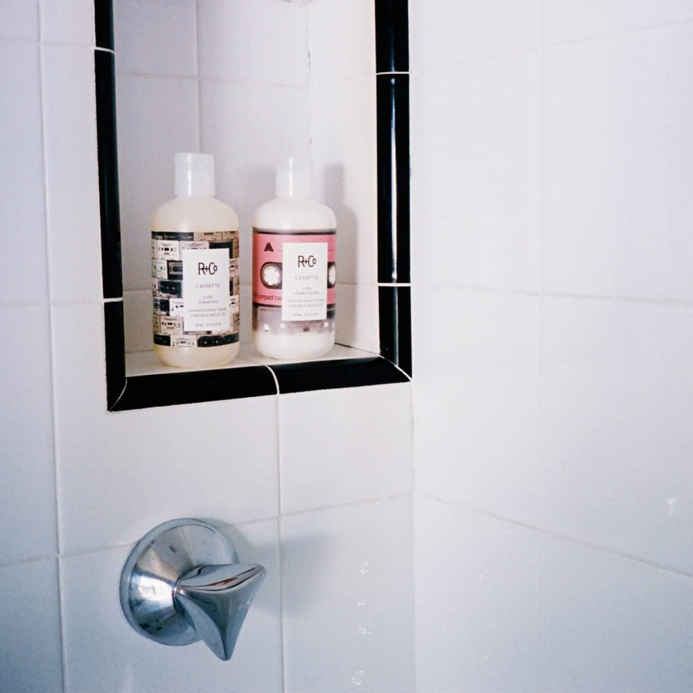 R+Co Cassette Curl Shampoo lather demonstrates gentle cleansing for curly hair.