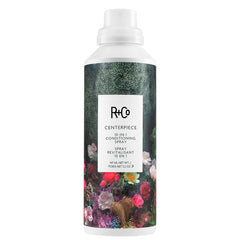R+Co Centerpiece bottle elixir spray for quick detangling and hydration.