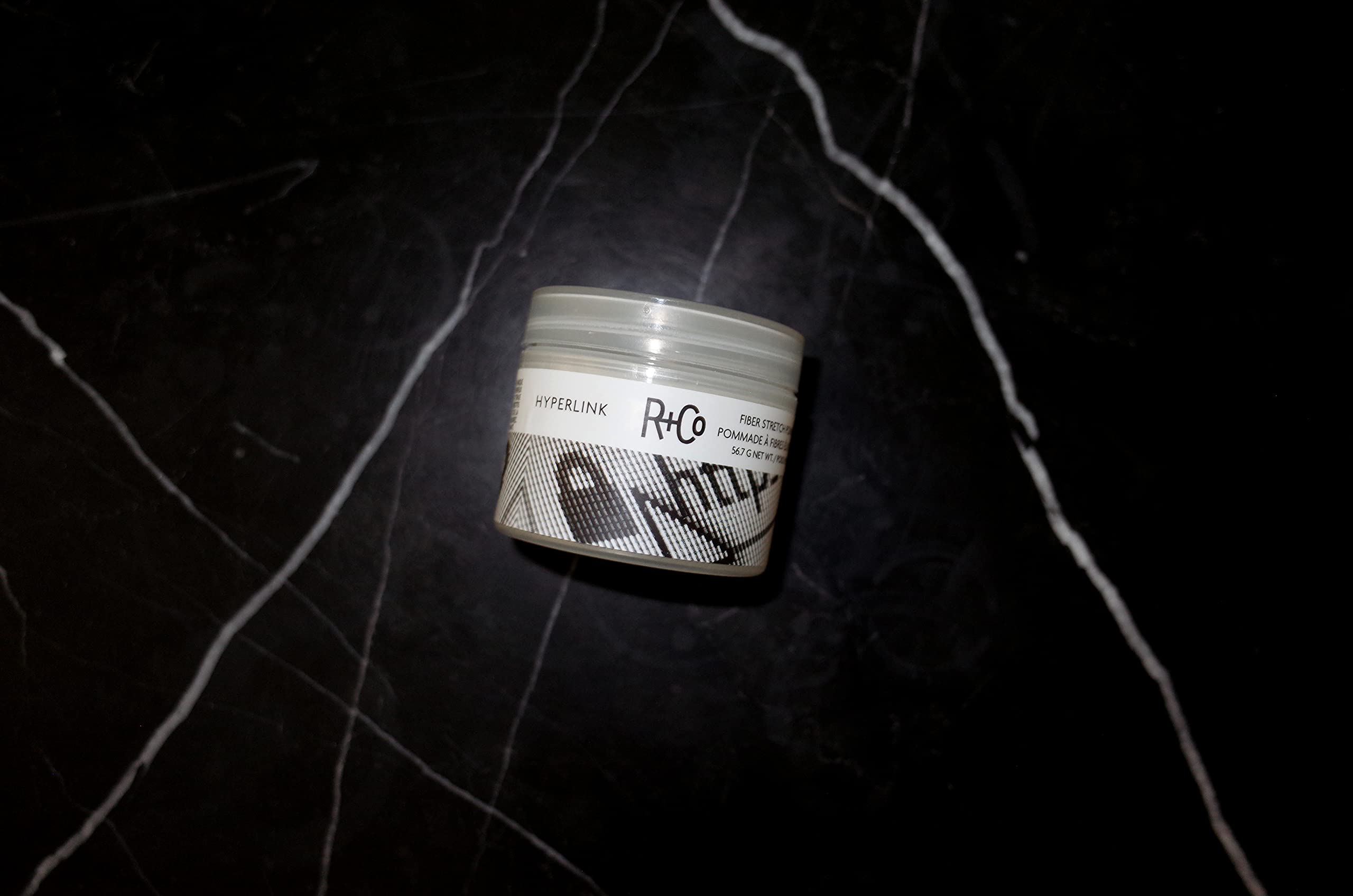Styled hair with Hyperlink for natural shine and controlled texture.