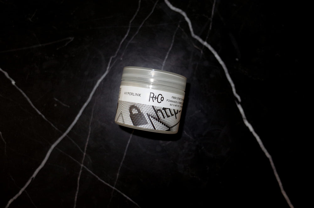 Styled hair with Hyperlink for natural shine and controlled texture.