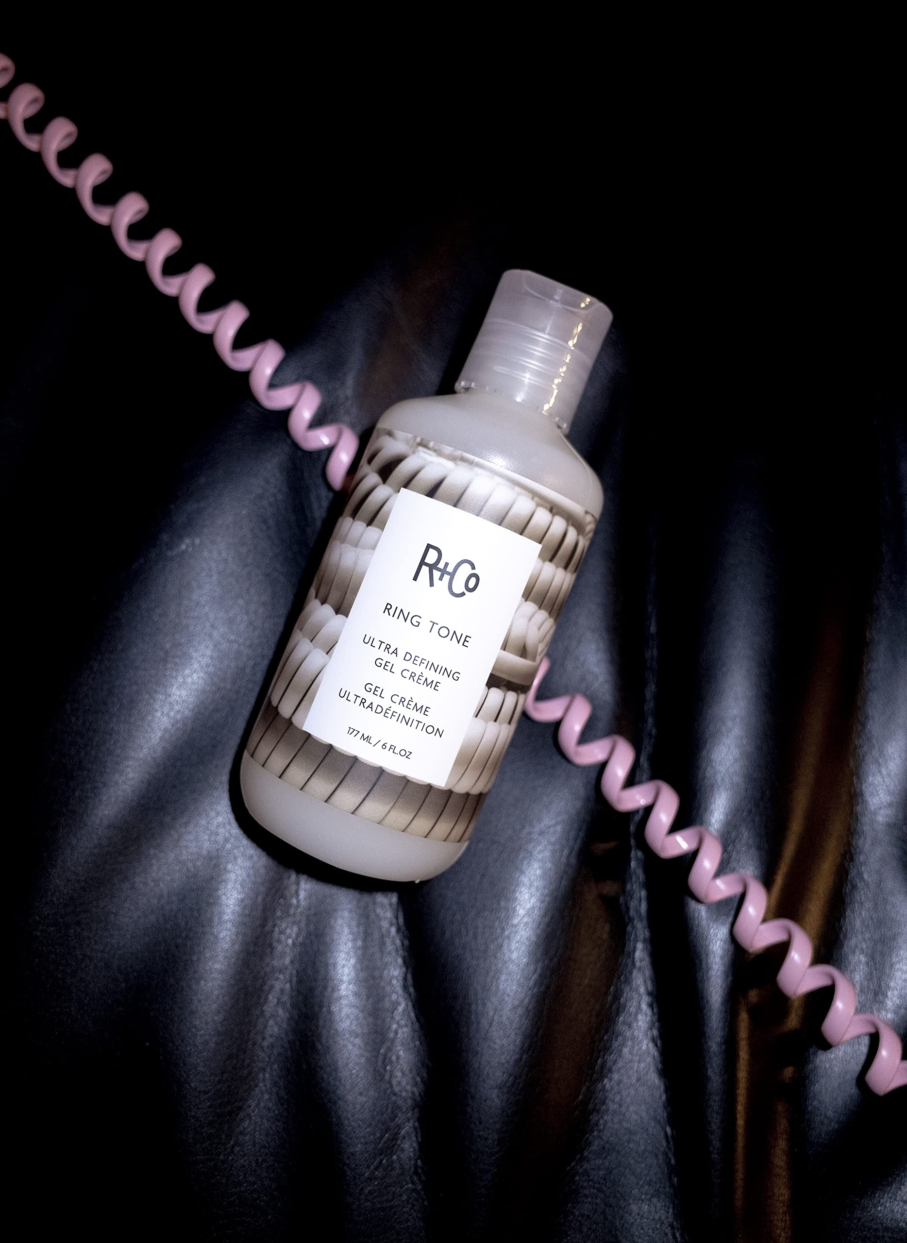 Ring Tone gel creme on textured hair reflecting healthy shine