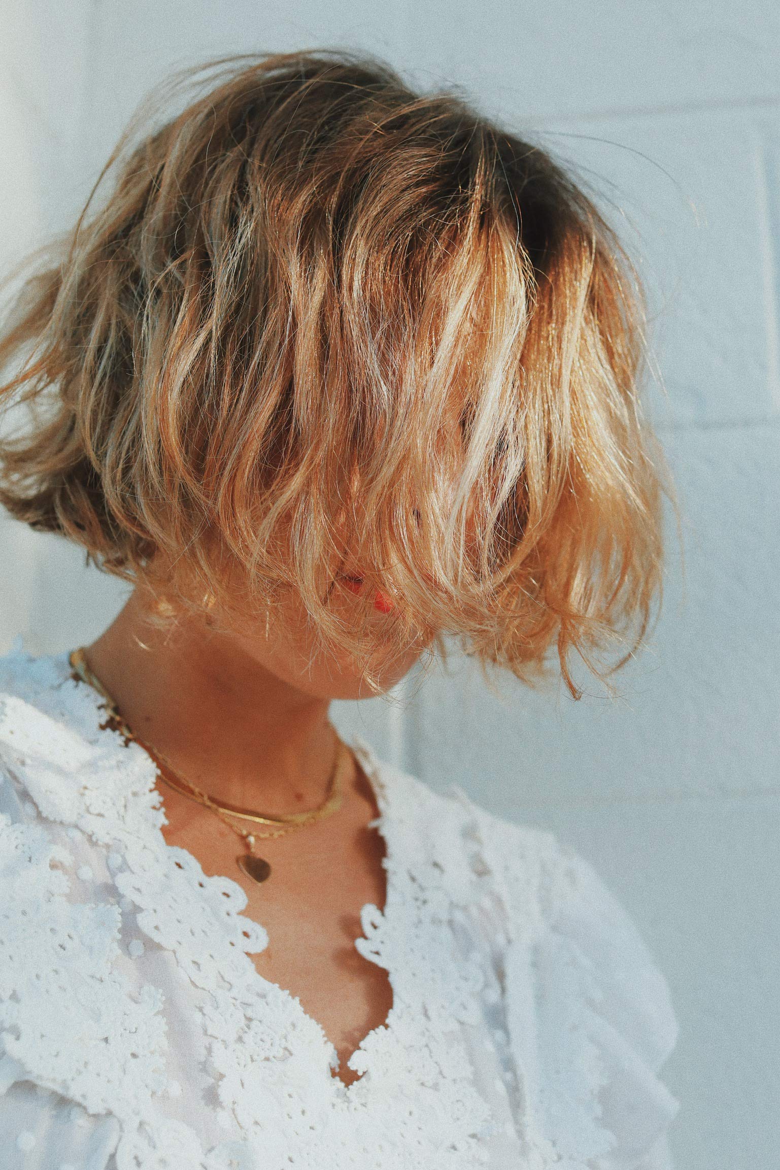 R+Co Sun Catcher Power C Leave-In applied to damp hair before styling