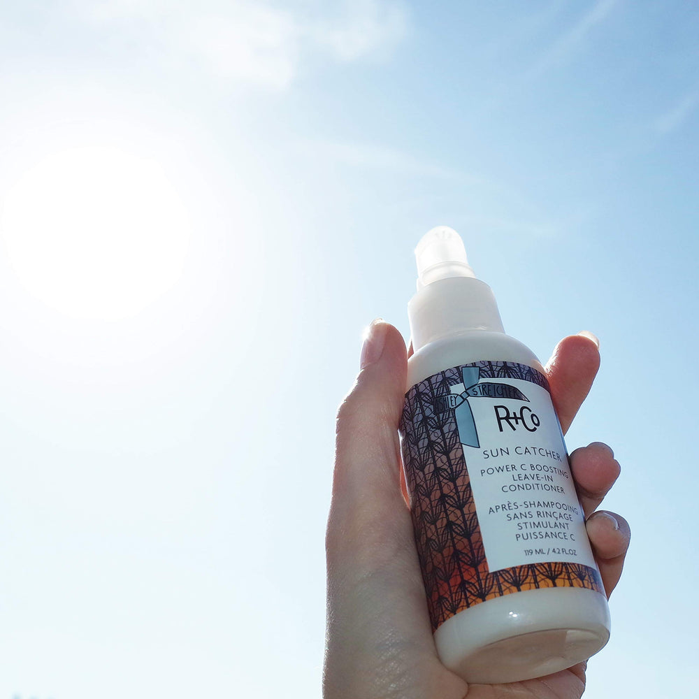 R+Co Sun Catcher Power C Leave-In applied to dry hair for touch-ups