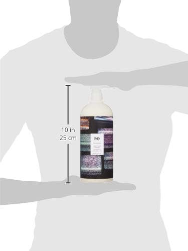 R+Co Television Perfect Hair Shampoo lather forming in hand for cleansing.
