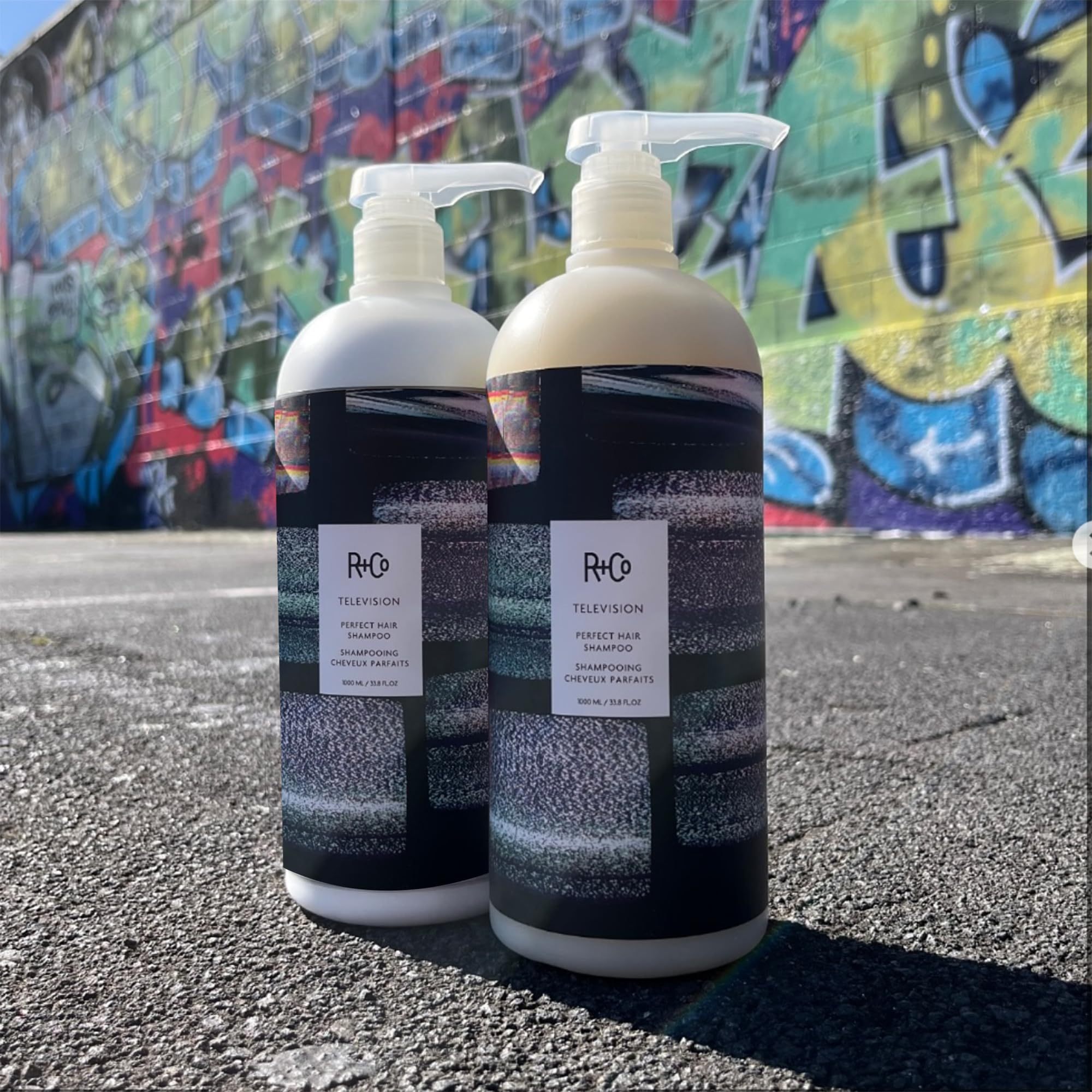 R+Co Television Perfect Hair Shampoo large 33.8 oz bottle for long-lasting use.