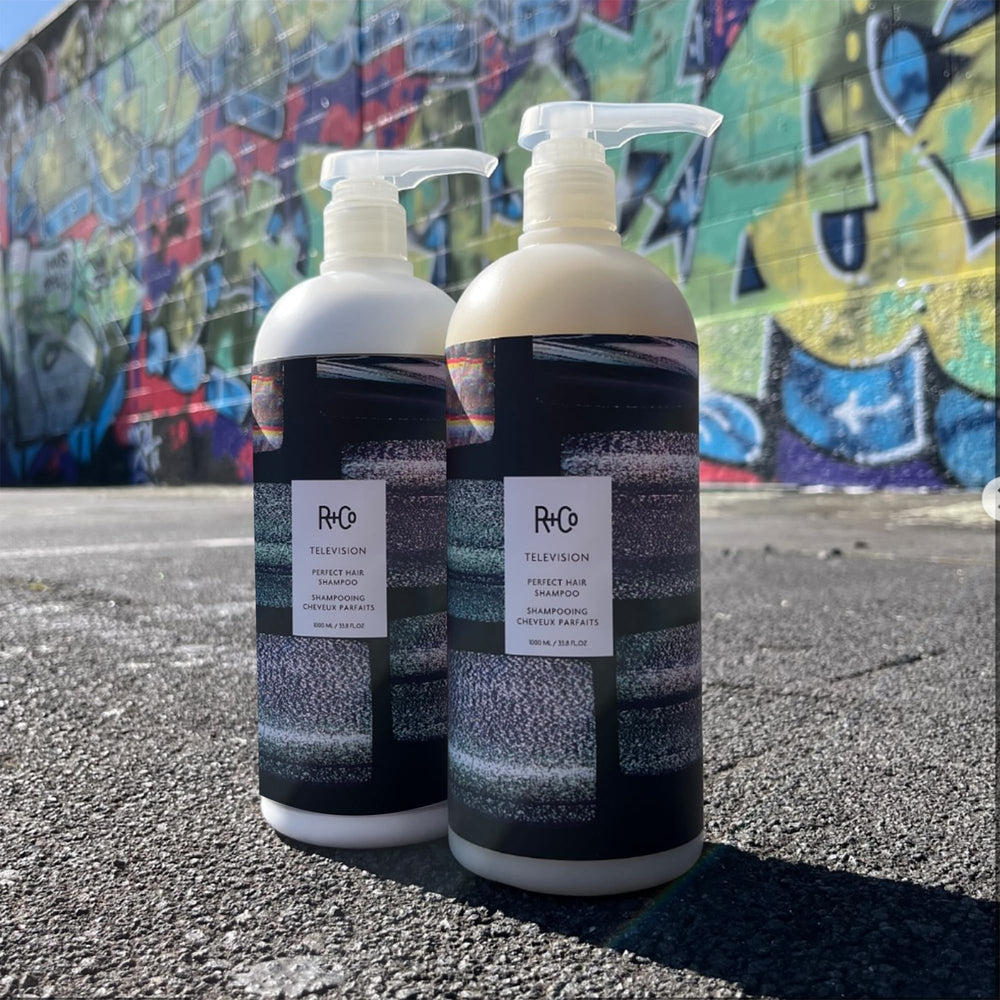 R+Co Television Perfect Hair Shampoo large 33.8 oz bottle for long-lasting use.