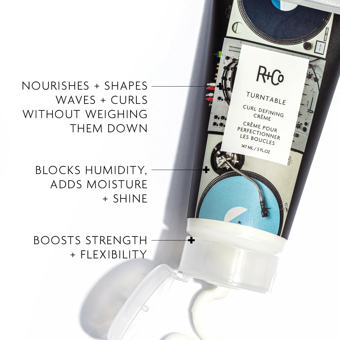 R+Co TURNTABLE texture shot highlights smooth, non-crunch curls.