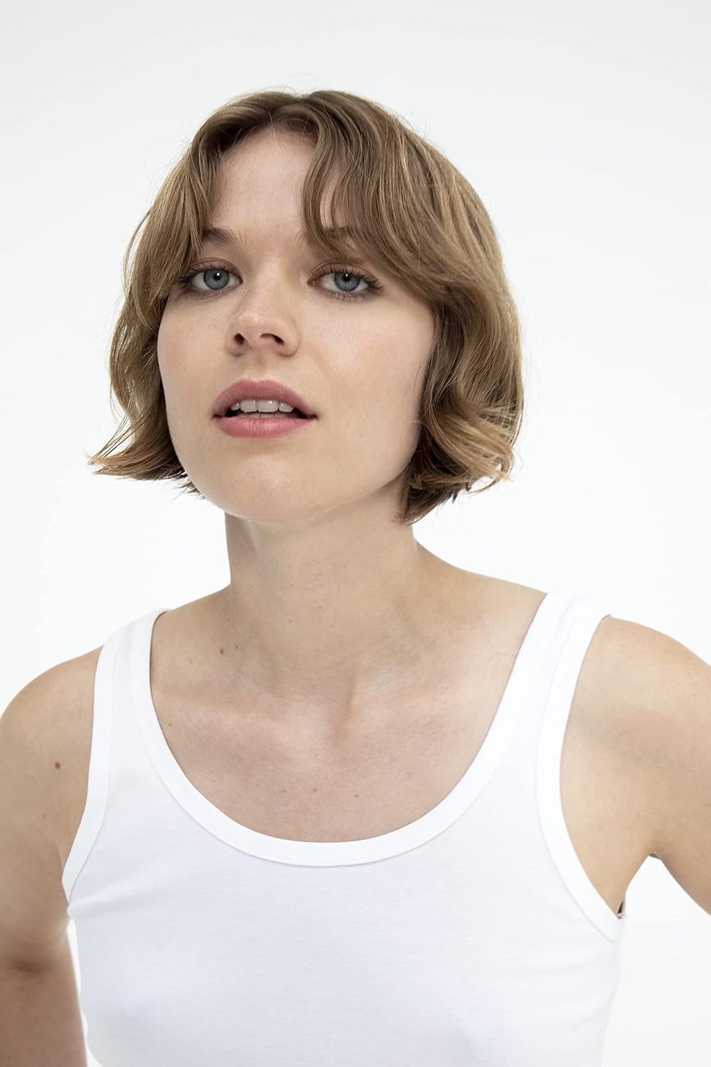 R+Co Two Way Mirror silicone feel close-up highlights soft, manageable strands.