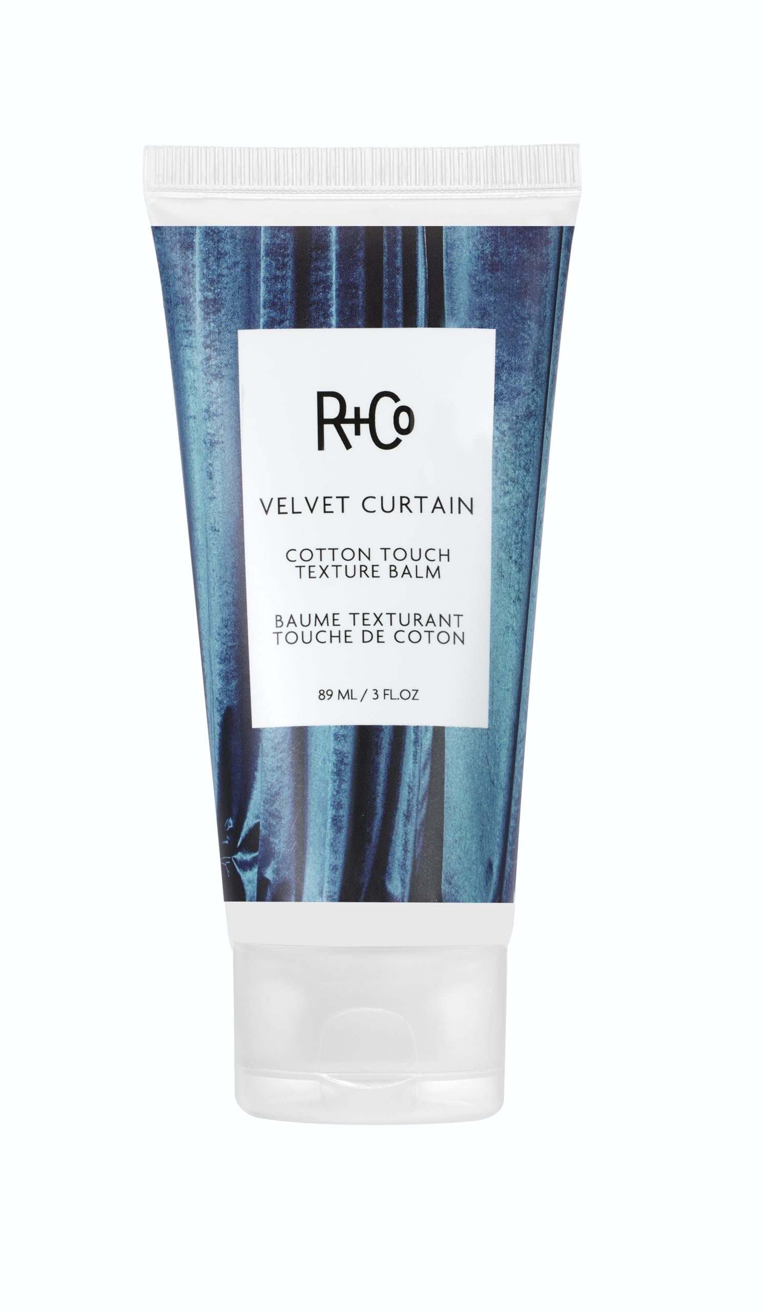 R+Co Velvet Curtain balm texture close-up for smooth, piecey hair.