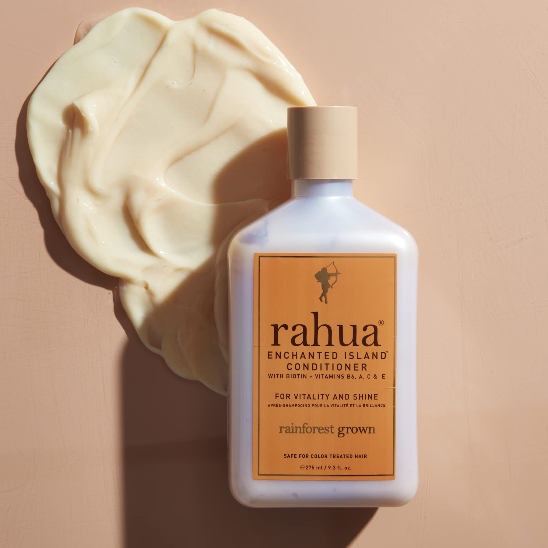 Ingredients panel featuring biotin, vitamins, and rainforest oils