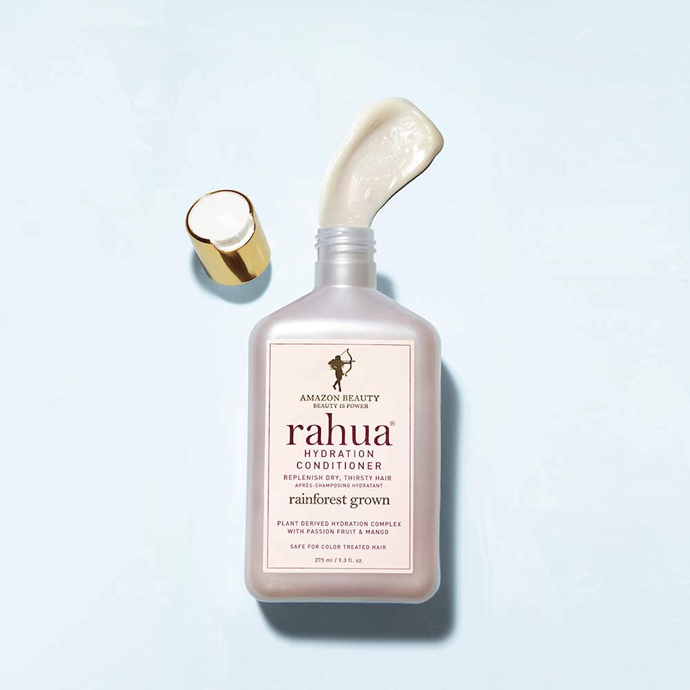 Close-up of hair showing reduced frizz after using Rahua conditioner.