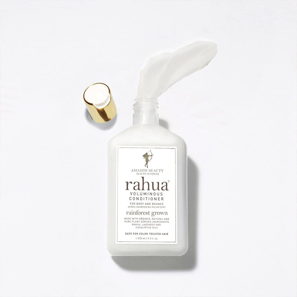 Silky texture of Rahua Voluminous Conditioner on hair strands