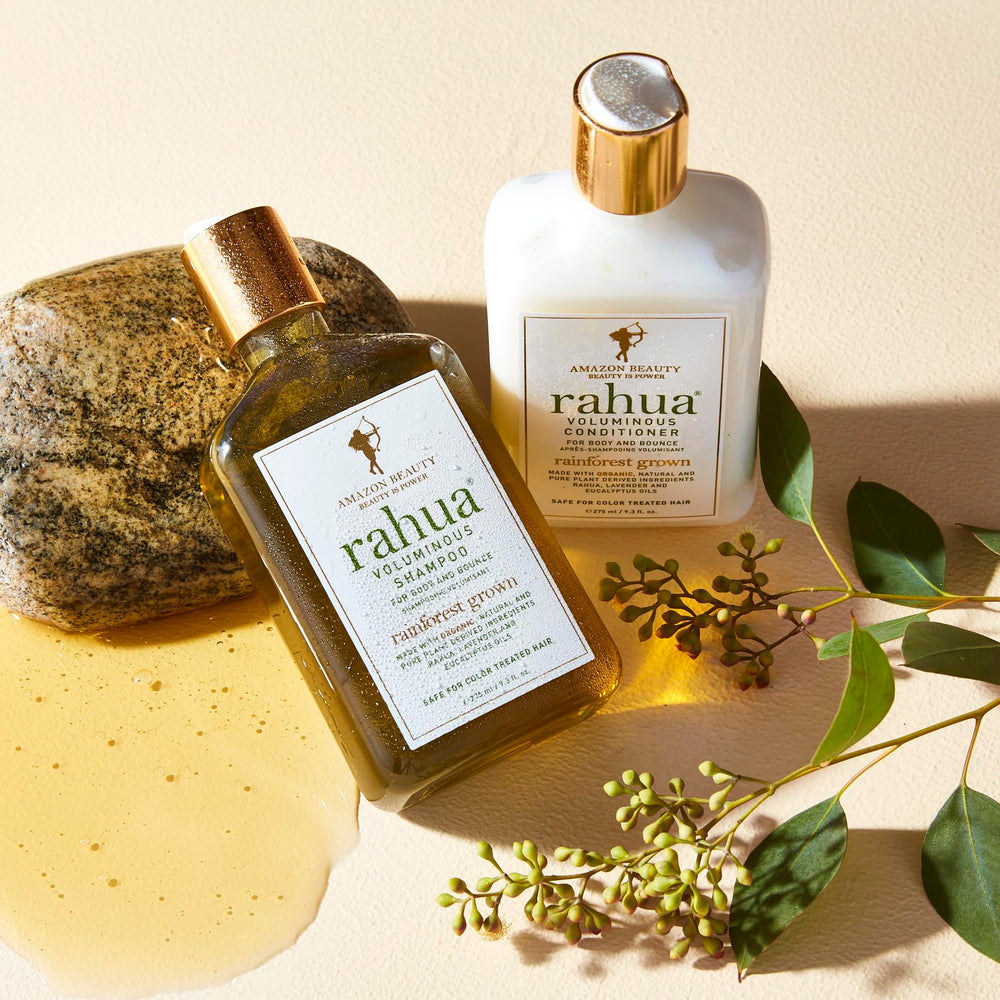 Rahua Voluminous Shampoo on bathroom shelf with calming ambience