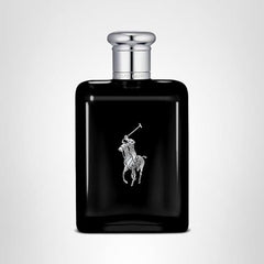 Ralph Lauren Polo Black bottle spray in use, suggesting lasting freshness from day to night.