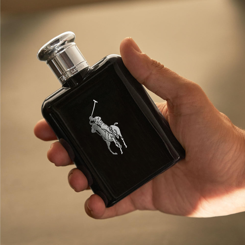 Polo Black spray pulse-points demonstrates application to pulse points.