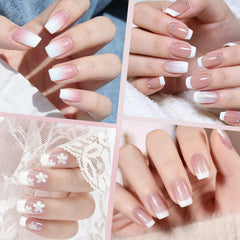 Ranrose white French tip nails closeup showing crisp edge.
