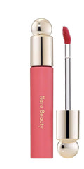 Rare Beauty Soft Pinch labial tintado, aceite hidratante para color suave y comodidad diaria.
