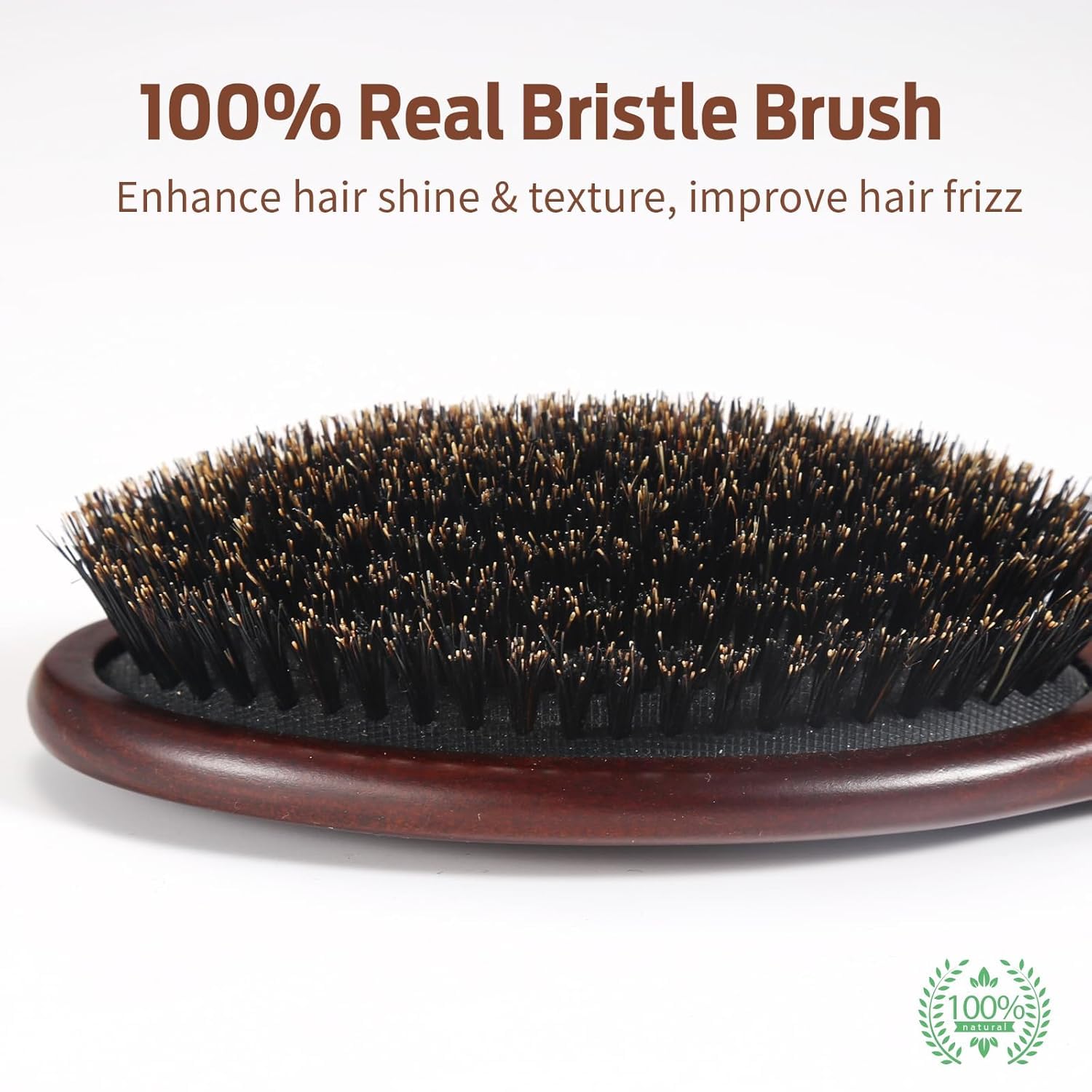 RAVEGO boar bristle brush close-up shows natural bristles for even oil distribution.