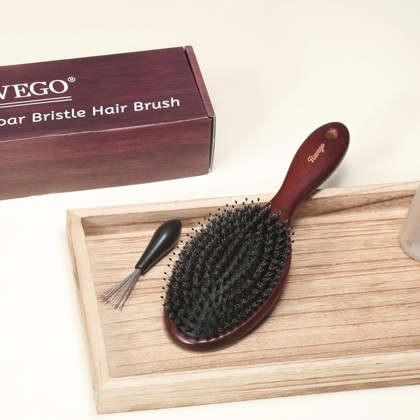 RAVEGO detangling brush reduces frizz and enhances manageability.