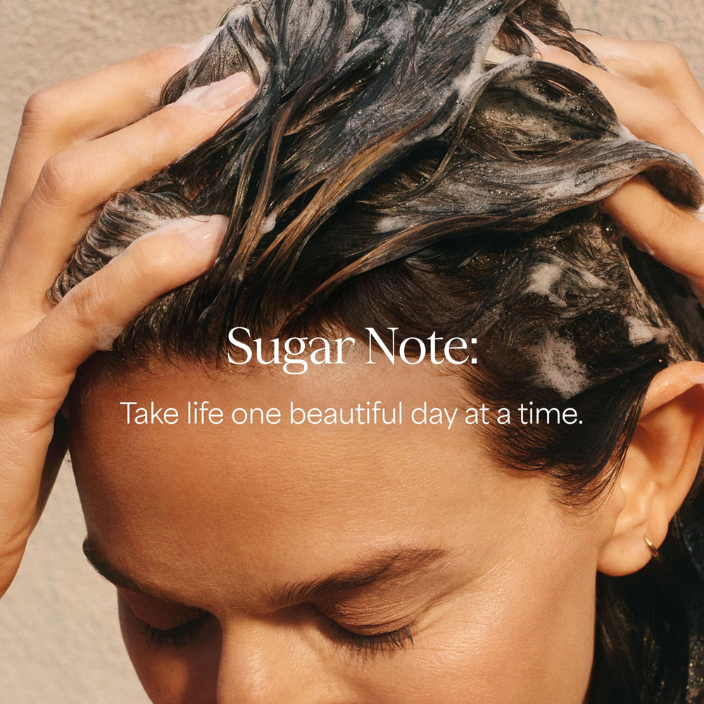 Raw Sugar Scalp Restore Conditioner on hair shows smoothing and moisture.