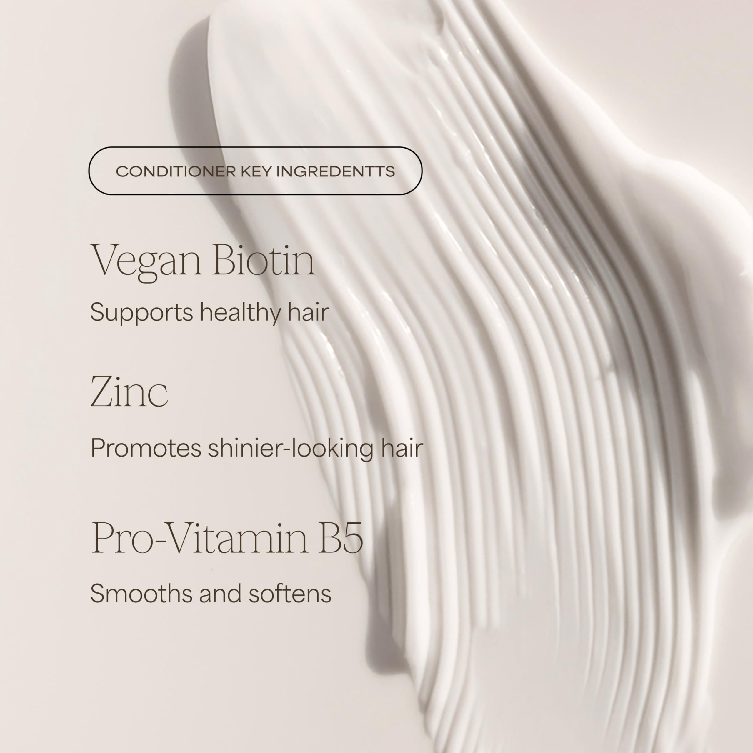 RAW SUGAR Grow Pro conditioner texture showing moisture on strands.