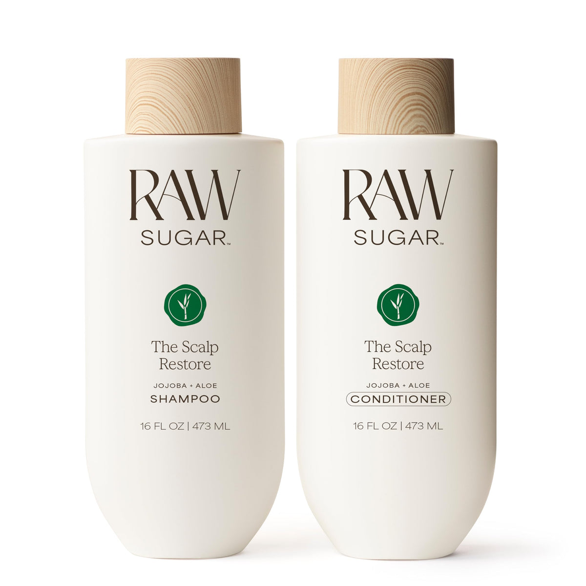 Raw Sugar Scalp Restore Shampoo bottle emphasizes jojoba and aloe for a refreshed scalp.