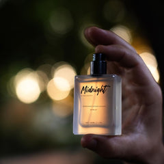 RawChemistry Midnight bottle side view highlighting premium bottle design.