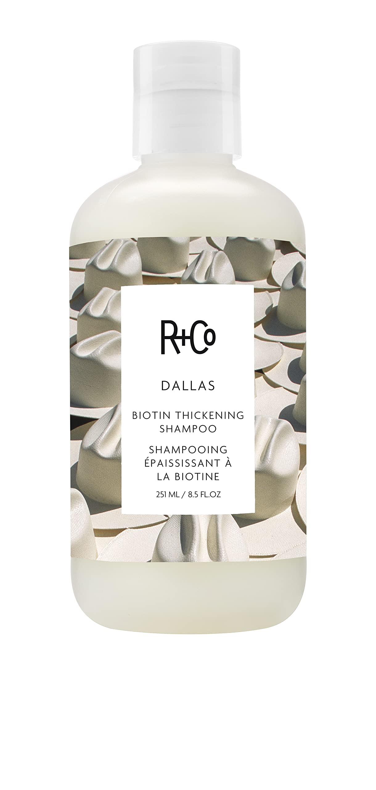R+Co Dallas thickening shampoo bottle closeup highlights volumizing potential