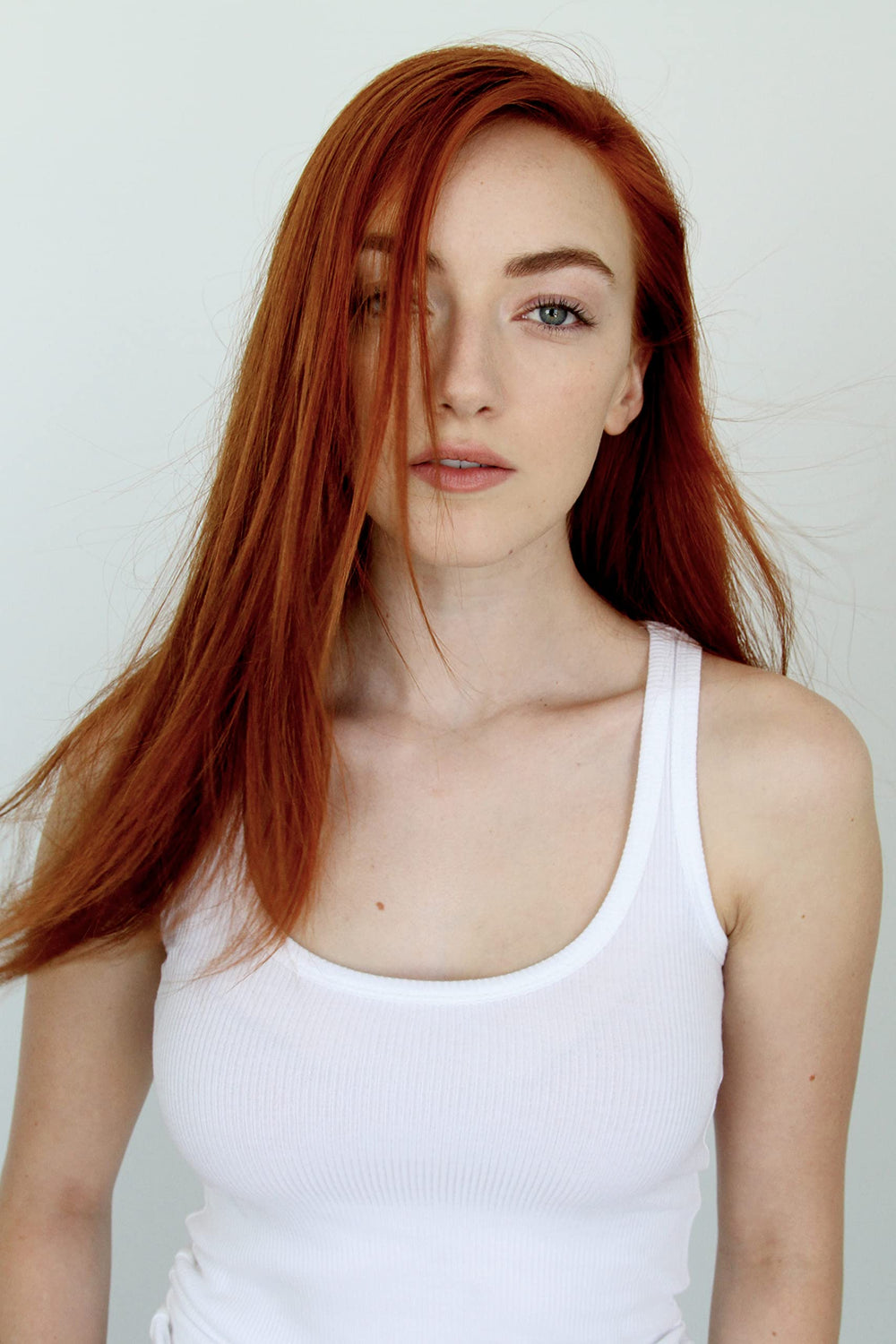 Creamy lather forms as Gemstone Color Shampoo cleanses color-treated hair gently.