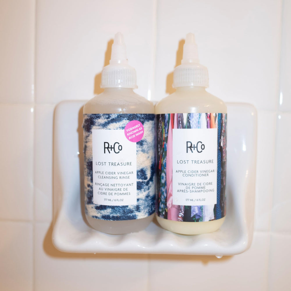 R+Co rinse in shower use on wet hair showing effective buildup removal