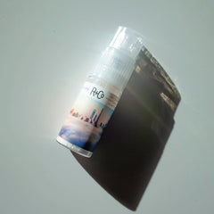 R+Co Skyline Dry Shampoo Powder targets roots with precision spray for freshness.
