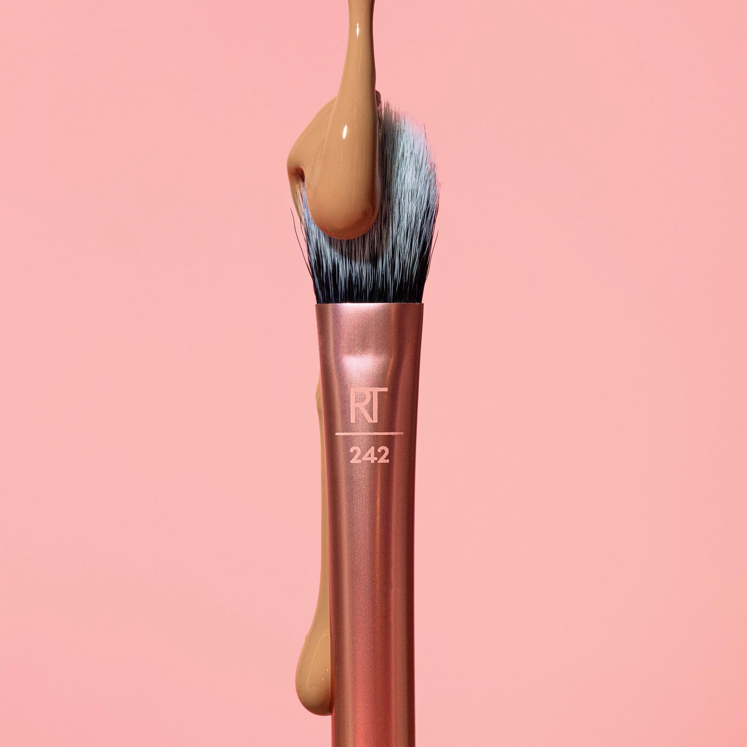 Real Techniques kitten-paw under-eye brush supports brightening application for lifted look
