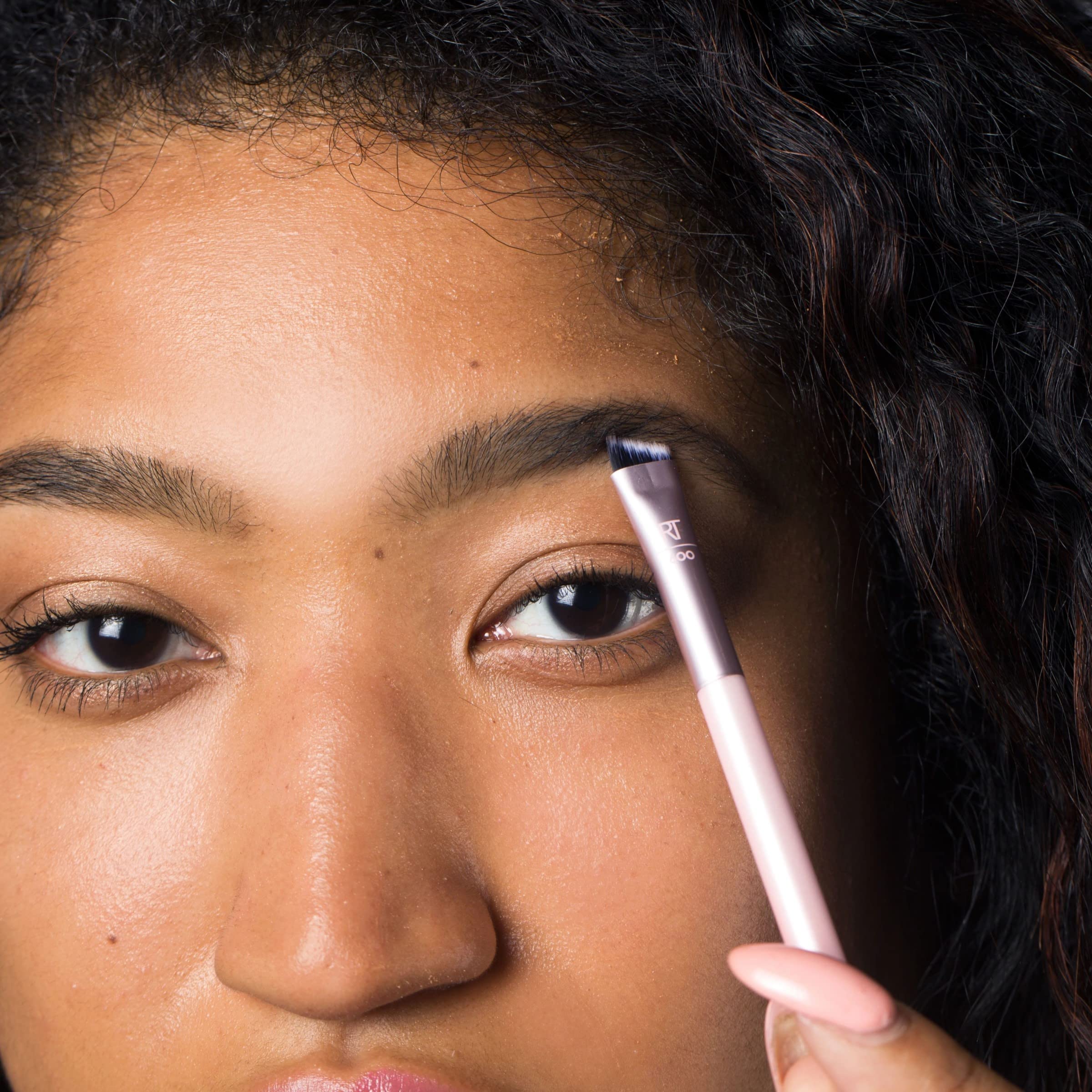 Real Techniques dual-ended brow brush applying product for even fill